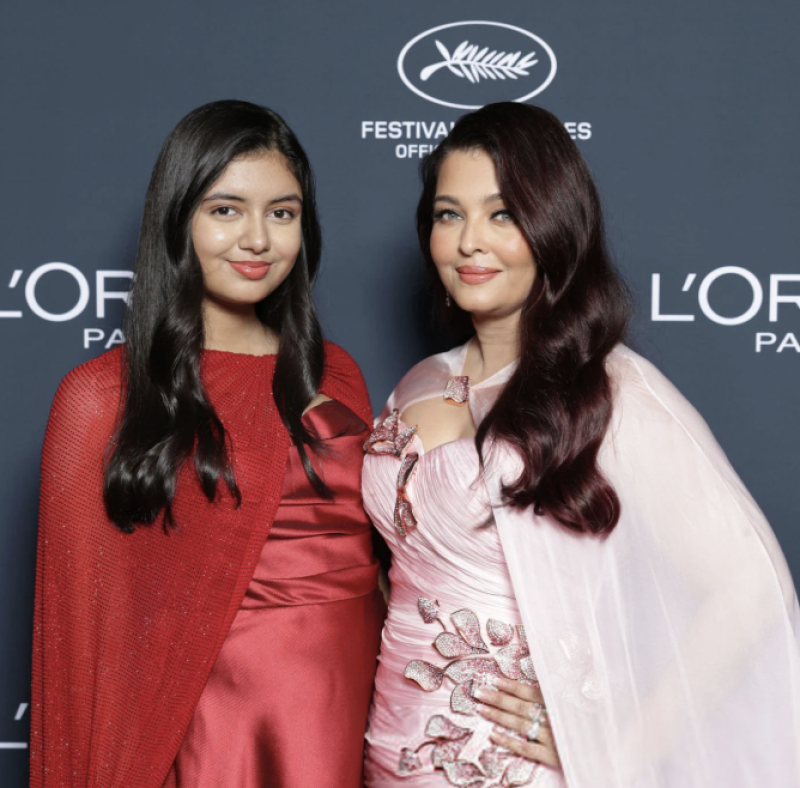 aaradhya-bachchan-steals-spotlight-at-cannes-2026-in-stunning-red-gown-alongside-aishwarya-rai