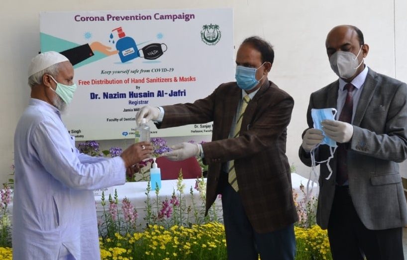 free-mask-and-sanitizer-distribution-under-corona-prevention-campaign-at-jmi