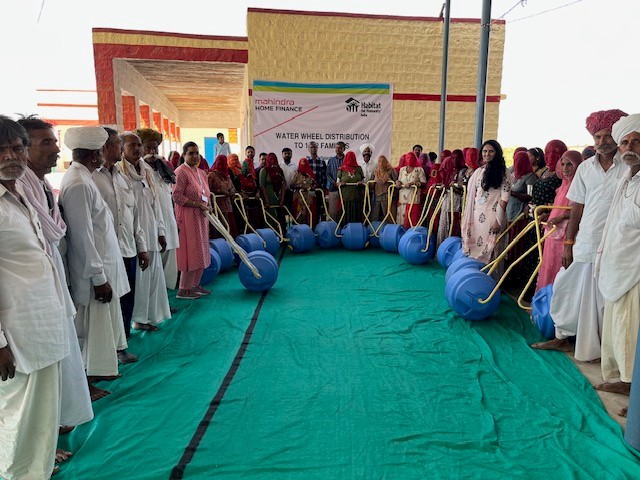 mahindra-rural-housing-finance-and-habitat-for-humanity-join-hands-to-distribute-1062-waterwheels-in-barmer-rajasthan